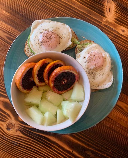 Sourdough with avocado toast and eggs  