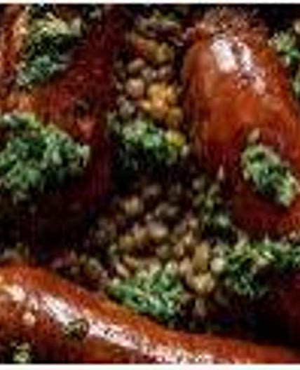 Cavolo nero with lentils, sausages and salsa verde