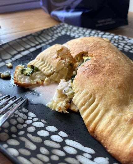 Breakfast spinach and egg calzone