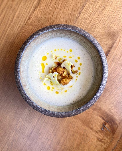 Cauliflower soup, curry oil, almonds and sultanas from Simpson's Restaurant, Edgbaston