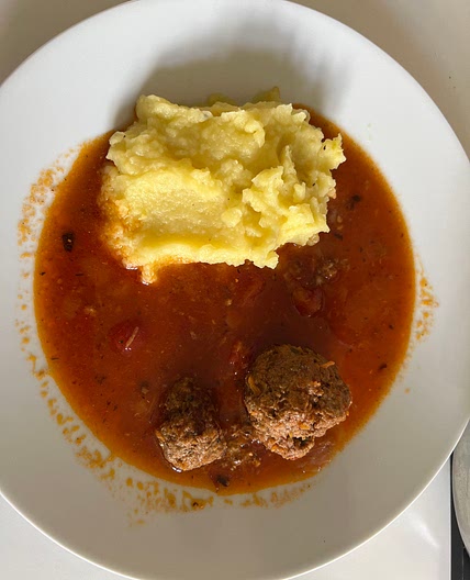 Fried Meat Balls in a Mezcal, chile ancho creamy red sauce