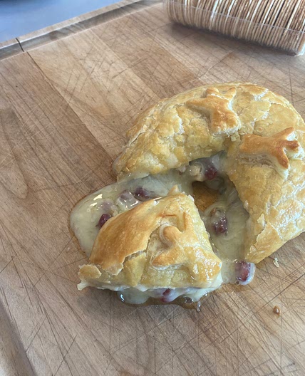 Baked Stuffed Brie with Cranberries & Walnuts