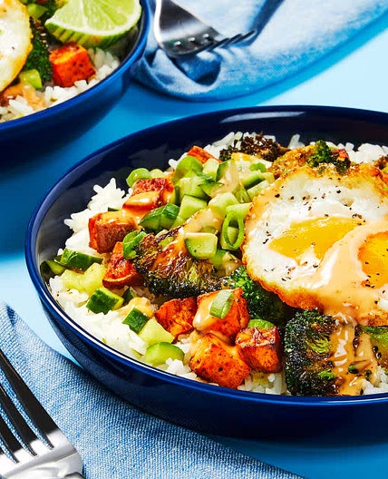 Sweet Potato & Broccoli Donburi

with Scallion Rice, Pickled Cucumber & Sriracha Mayo