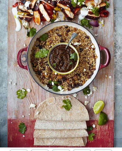 SIZZLING CHICKEN FAJITAS GRILLED PEPPERS, SALSA, RICE & BEAN