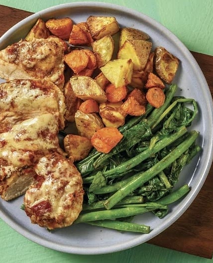 Pizza Chicken with garlic butter beand and roast vegetables