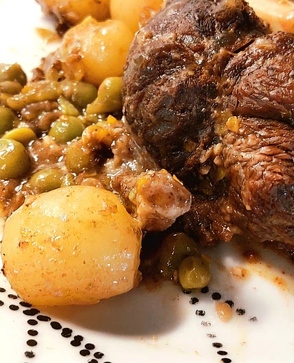 Ossobuco with peas and potatoes
