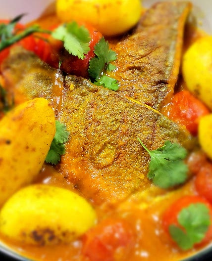 Sea bass with Bengali fish broth