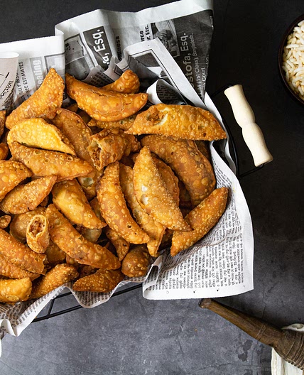 Jhuni Pitha (Crispy Coconut fritters )