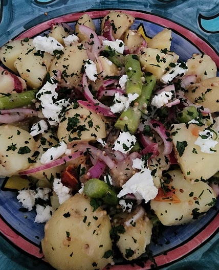 Warm Potato salad with asparagus, semi sundried tomatoes & goats cheese