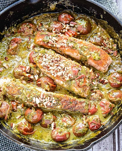 Creamy Pesto Salmon with Roasted Tomatoes and Pecans