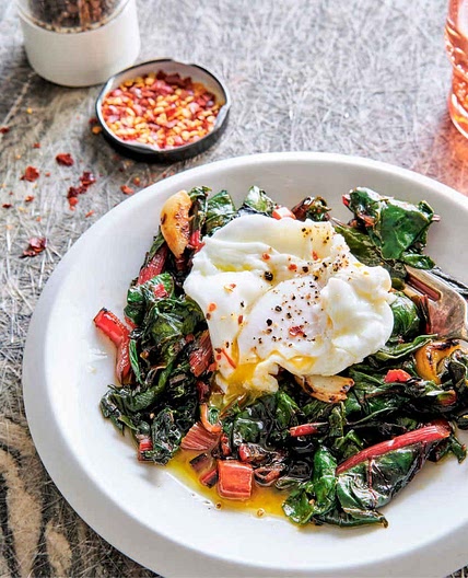 Poached egg and silky braised greens