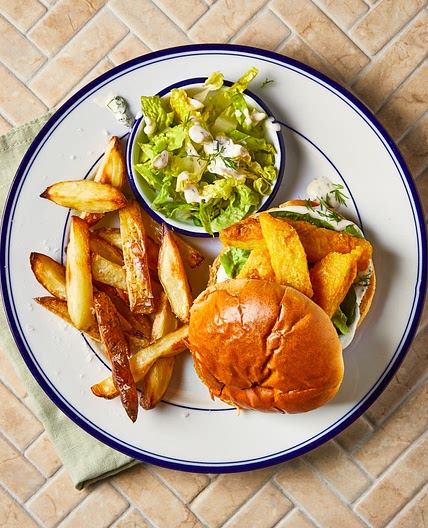 Posh fish finger sandwich with chips, crunchy gem and dill mayo