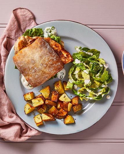 Spiced chicken ciabatta with herby potatoes 