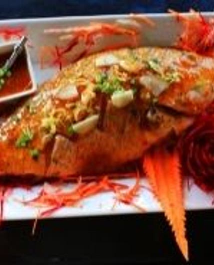 Baked snapper on its bed of potatoes
