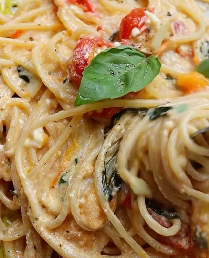 Confit tomato &amp; mascarpone spaghetti 🍝 this is a SOLID 10/10 so do your tastebuds a favour and make it asap xo 2 servings: 250g dried spaghetti 300g good quality cherry tomatoes 4 garlic cloves peeled 5tbsp extra virgin olive oil 200g mascarpone Handf