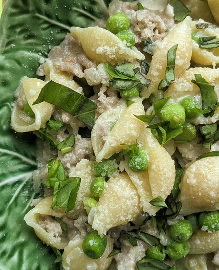 Tagliatelle with Smashed Peas, Sausage, and Ricotta Cheese