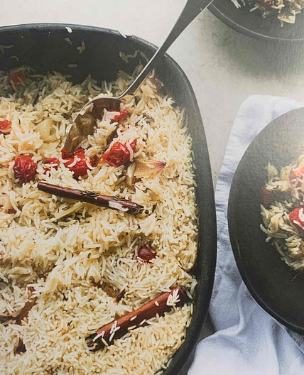 Baked rice with confit tomatoes and garlic 