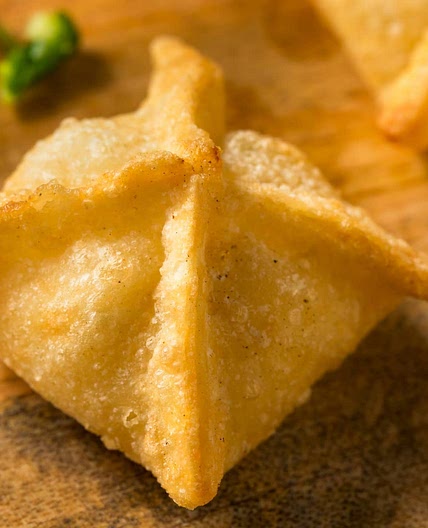 Crispy Chicken Wontons With Spicy Chili and Lime Sauce