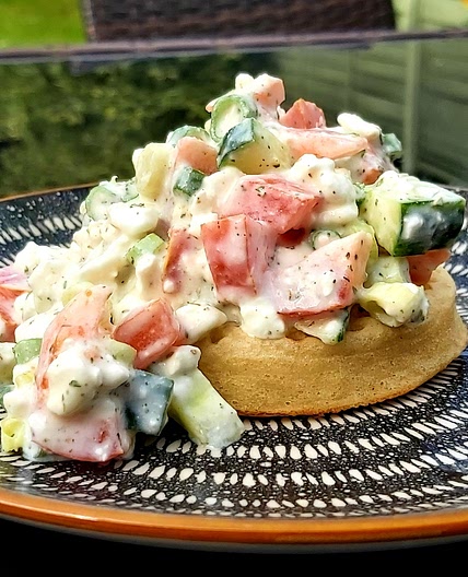 Toasted crumpet, low fat cottage cheese, tomato, cucumber, spring onion