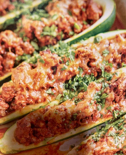 Enchilada stuffed zucchini boats