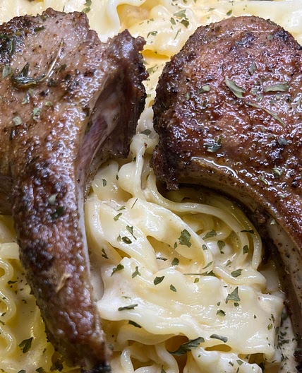 Garlic & Herb Crusted Lamb Chop w/ Creamy Mafaldine Alfredo