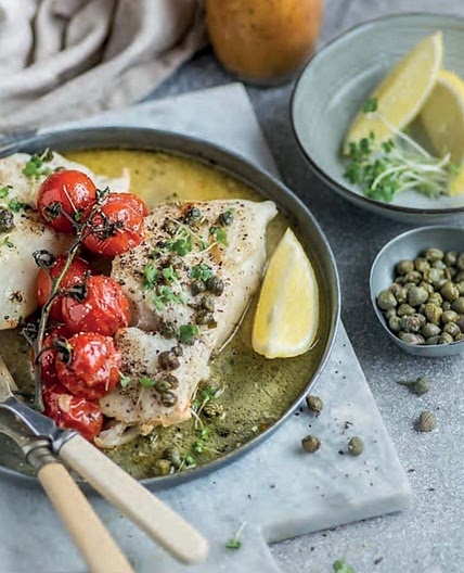 Baked haddock with tomatoes