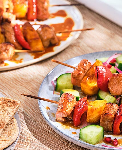 Pork & pineapple skewers with cucumber salad