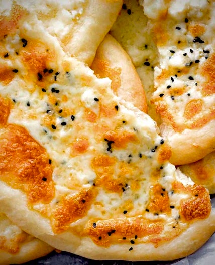 Mana’eesh B’Jibneh  or Cheese Flatbread
