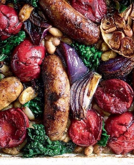 Sticky spiced sausage and plum traybake 