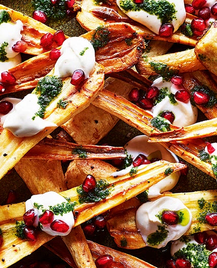 Roasted parsnips with tahini yoghurt sauce, herb oil and pomegranate…