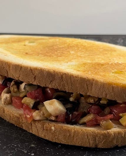 Giant eggplant bruschetta sandwich