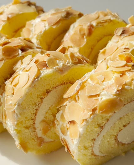 Cake Roll Covered With Baked Almond Slices