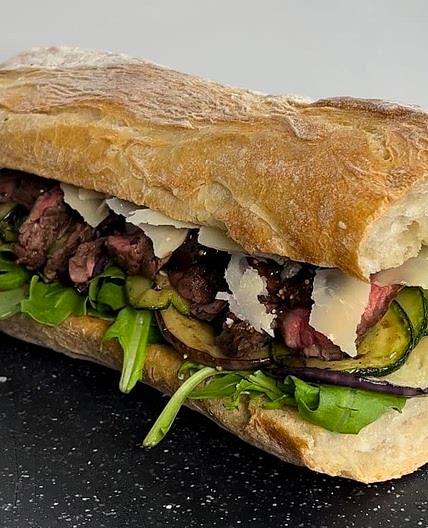 Steak and grilled vegetables sandwich
