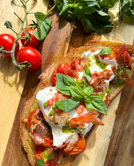 Tomato & Garlic Confit, Burrata, Pesto, Crispy Proscuitto Bruschetta