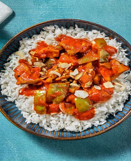 Chicken and Pepper Rogan Josh Style Curry with Mango Chutney, Flaked Almonds and Basmati Rice