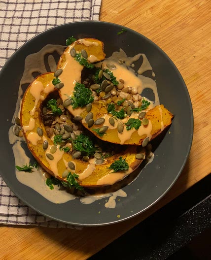 Baked pumpkin with lentils and sriracha yogurt