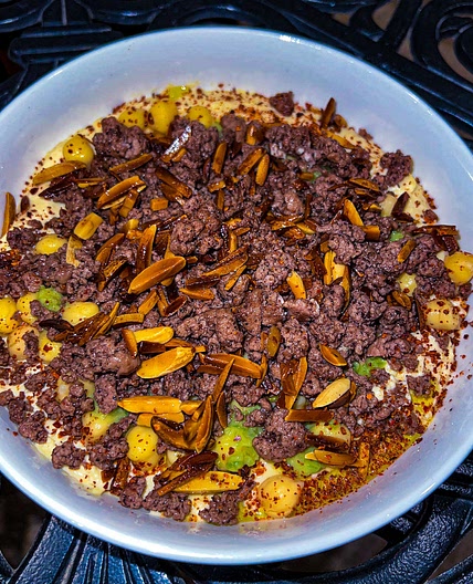 LAYERED HUMMUS WITH MEAT & SPICY AVOCADO SAUCE