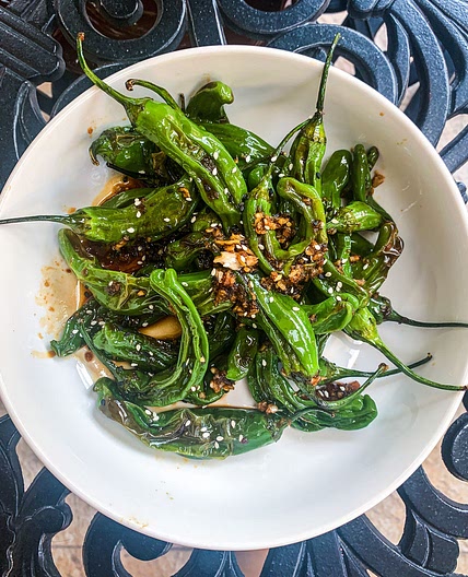 ROASTED SHISHITO PEPPERS WITH A GARLIC SOY SAUCE