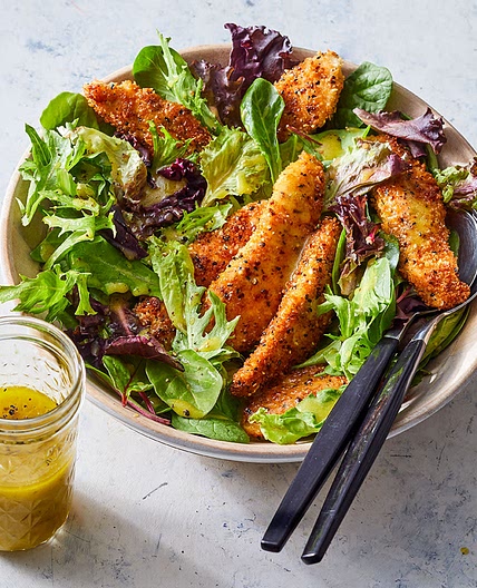 Homemade Chicken Tenders with Everything Bagel Seasoning Over Salad