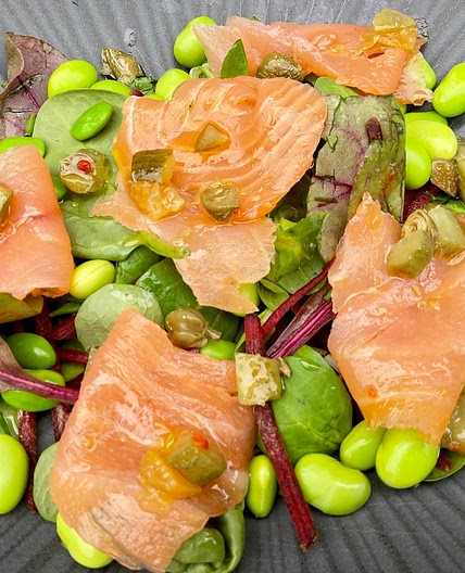 Smoked Trout on an Edamame Bean Salad topped with a Preserved Lemon and Caper Salsa