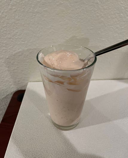 Mango, pineapple, strawberry, banana smoothie