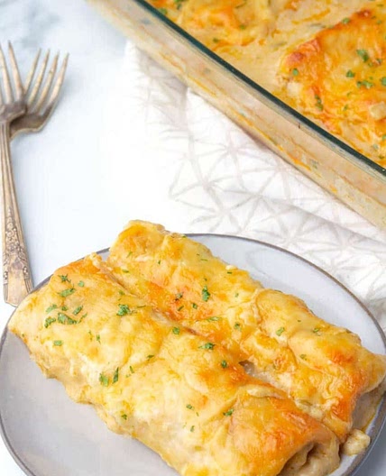 Creamy white chicken enchiladas