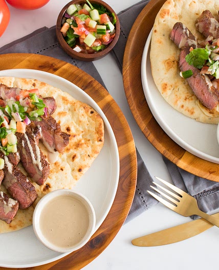 Cumin Steak Shawarma with Israeli Chop Salad and Tahini