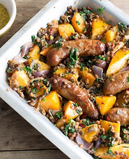 Sausage & squash bake with lentils, red onions, spinach & mustard