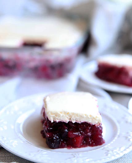 Holiday Cranberry pineapple jello with whipped cream cheese topping