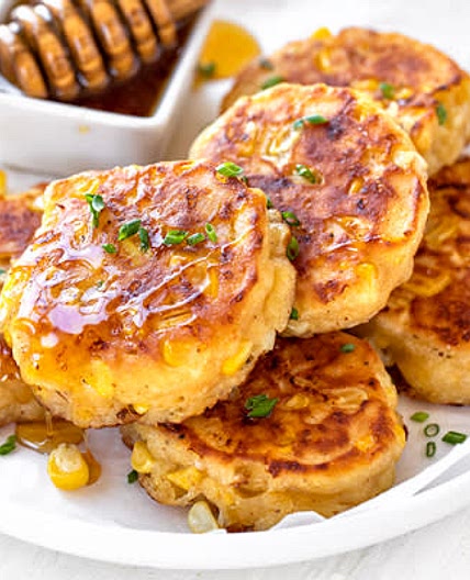 Cheesy Honey Cajun Corn Fritters