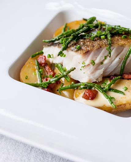 Pan Roasted cod with confit Jersey royals with pancetta