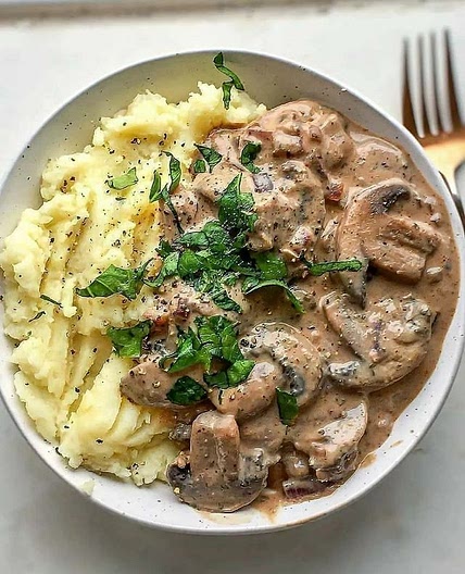 Mushroom Stroganoff with fluffy mashed potato by