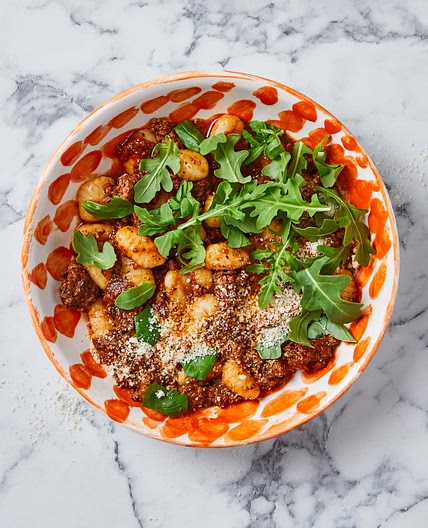 Herby beef gnocchi bolognese