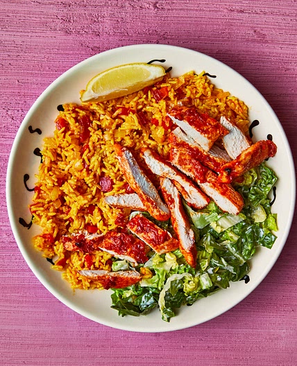 Peri peri chicken with spicy rice and lemony salad